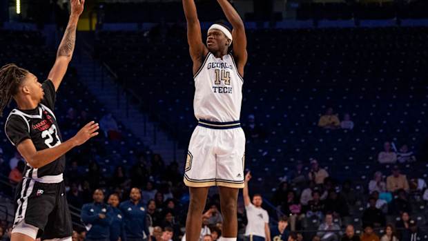 Kowacie Reeves shooting a basketball vs Clark Atlanta